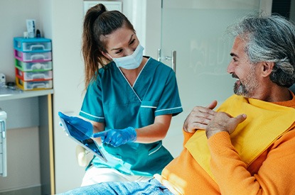 Patient in Keller smiling at dental checkup.