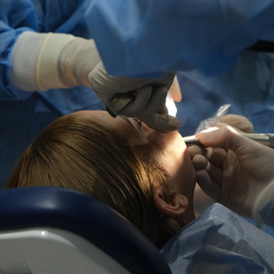 Woman getting oral surgery