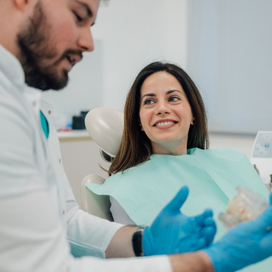 Woman smiling in the dental chair