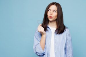 Woman wondering about cavities during her Invisalign treatment