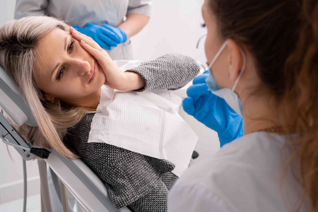 Woman with tooth pain